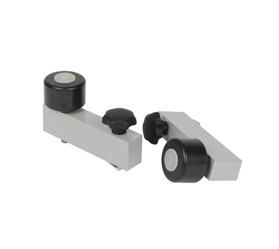 Stopper rollers for grinding circular panes